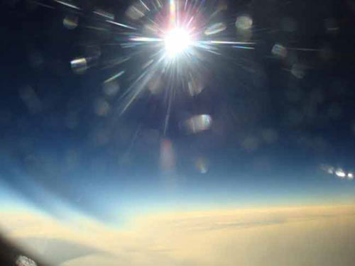 image taken 30 seconds before totality (the total phase) of the Aug. 1, 2008 solar eclipse, from the window of a jet flying over the Arctic Ocean