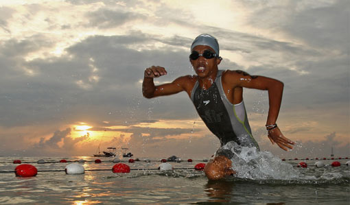 Andi Edinata of Indonesia comes out of the water during the Men's Triathlon 