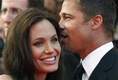 Voice actor Angelina Jolie and Brad Pitt arrive for the screening of the animated film 'Kung Fu Panda'