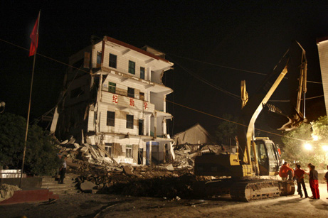 collapsed school in Chongqing, China, in 7.8 magnitude quake