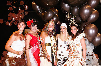 Laetitia Bleger, Valerie Begue, Elodie Gossuin, Alexandra Rosenfeld and Rachel Trapani display a chocolate decorated dress during the Chocolate dress fashion show celebrating the opening of the 14th Salon du Chocolat at the Porte Versailles, on October 28, 2008 in Paris, France