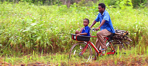 father and child on bike