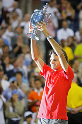Federer with the 2008 U.S. Open trophy, which he has held since 2004