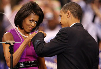 U.S. Sen. Barack Obama and his wife affectionately bumped fists on stage last week as he prepared to make his victory speech U.S. Sen. Barack Obama and his wife affectionately bumped fists on stage last week as he prepared to make his victory speech