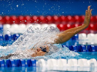 Natalie Coughlin swims the 100 meter backstroke en route to setting a new world record of 59.03 during the U.S. at the Swimming Olympic Trials on June 30, 2008 at the Qwest Center in Omaha, Nebraska
