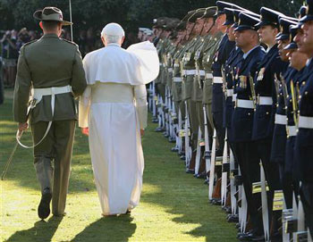 Pope Benedict XVI inspects a guard of honour during the ceremonial welcome at Government House, as part of World Youth Day, in Sydney July 17, 2008