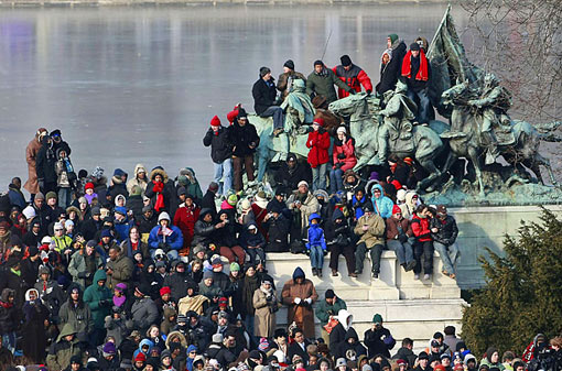 Standing Room Only: spectators for the swearing-in ceremony seek perches on the National Mall