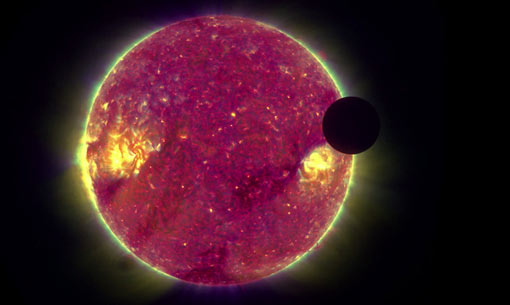 transit of the Moon across the face of the Sun