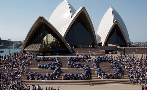 At the Sydney Opera House in Australia, activists form a human ‘350,’ which some scientists call the upper limit for heat-trapping carbon dioxide in the atmosphere, in parts per million. Over 4,300 similar demonstrations were organized around the world on Saturday in a campaign to rein in the greenhouse gas emissions that contribute to global warming.