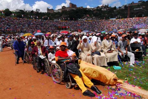 Madagascar President, Andry Rajoelina (unseen) addresses supporters after he was formally installed as leader of the Indian Ocean island during a ceremony in Antananarivo, Madagascar, 21 March 2009. Tens of thousands of his supporters attended the ceremony at a sports arena in the capital, Antananarivo, but it was boycotted by many diplomats