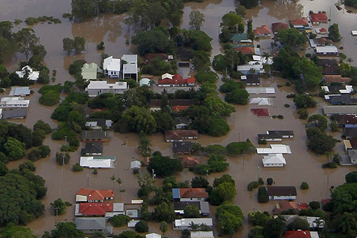 flooded Brisbane River in residential areas in Brisbane's south