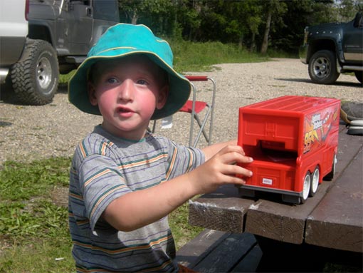 Demetrius Jones, who turned 3 yesterday, was rescued from swirling 10ft deep water, insisting that he wanted to get back on his ‘boat’ Demetrius Jones, who turned 3 yesterday, was rescued from swirling 10ft deep water, insisting that he wanted to get back on his ‘boat’