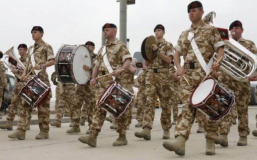 British military band performs during handover ceremony of Basra's international airport from British forces to U.S. forces
