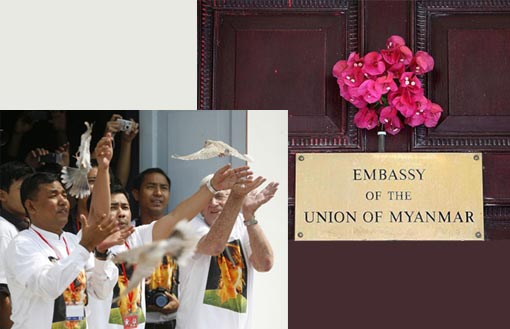 Left: Yangon, Burma: Two guitarists perform songs dedicated to Aung San Suu Kyi during a celebration to mark her 64th birthday at the headquarters of the National League for Democracy party; Right: flowers on the door of the Embassy of the Union of Myanmar (Burma) in London Left: Yangon, Burma: Two guitarists perform songs dedicated to Aung San Suu Kyi during a celebration to mark her 64th birthday at the headquarters of the National League for Democracy party; Right: flowers on the door of the Embassy of the Union of Myanmar (Burma) in London