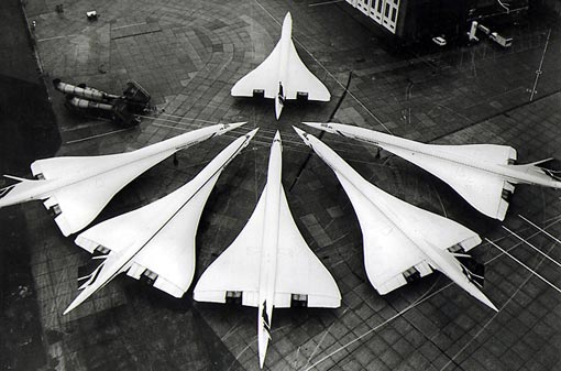 A cluster of Concordes gather nose-to-tail at London's Heathrow airport. Air France and British Airways ran a regular transatlantic service to New York with an average flight time of just 3 and a half hours.