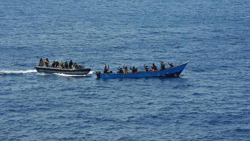 German Bundeswehr soldiers approach pirates in Gulf of Aden after German frigate Rheinland-Pfalz received a distress call from a German-owned container ship