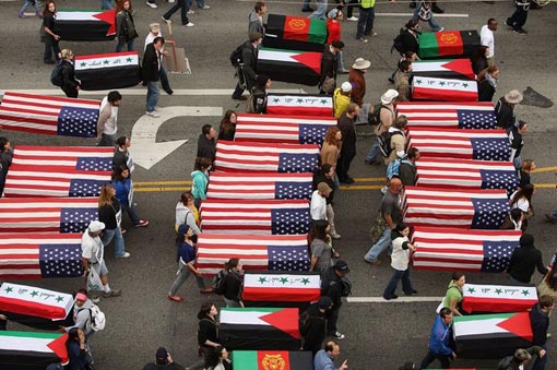 anti-war demonstrators on Hollywood Boulevard carry model coffins to mark the 6th anniversary of the Iraq War