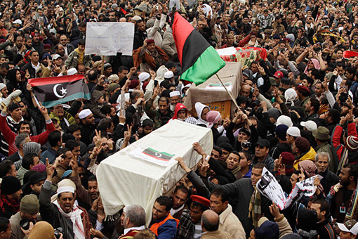 On Feb. 25, mourners carry coffins containing the bodies of Libyans who were killed in the recent clashes in Benghazi.