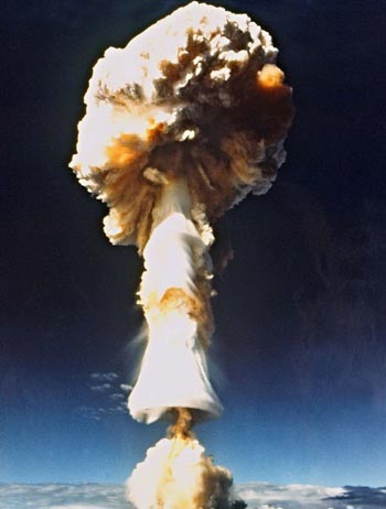 a mushroom cloud rises above Mururoa Atoll, French Polynesia, after a French nuclear test there in 1970
