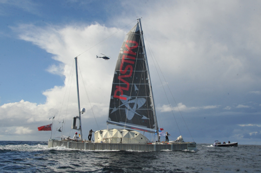 the Plastiki crew were met by a welcome flotilla of boats and hellicopters as they sailed through Sydney habour