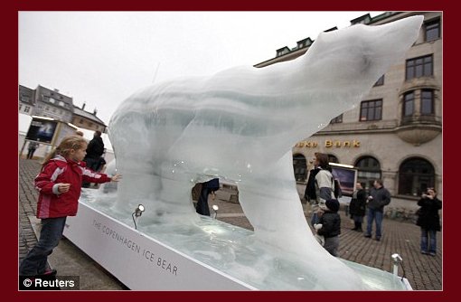 A melting ice sculpture of a polar bear in Copenhagen, where scientists told the climate change conference that carbon emissions must fall within 10 years.