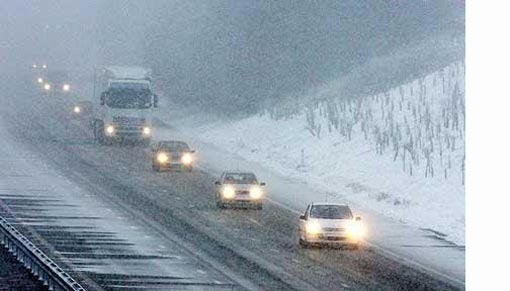 drivers face dangerous conditions on the M20 motorway near Ashford in Kent as snow sweeps the country