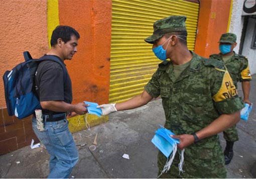 Mexican army giving out face masks as prevention against the swine flu virus