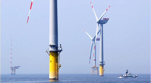wind turbines in the ocean. hundreds of wind turbines