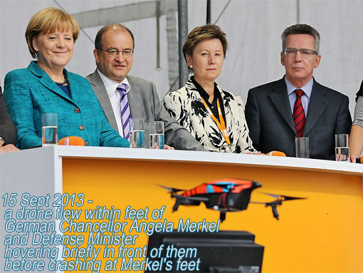 a drone flew within feet of German Chancellor Angela Merkel and Defense Minister, hovering briefly before crashing at Merkel's feet