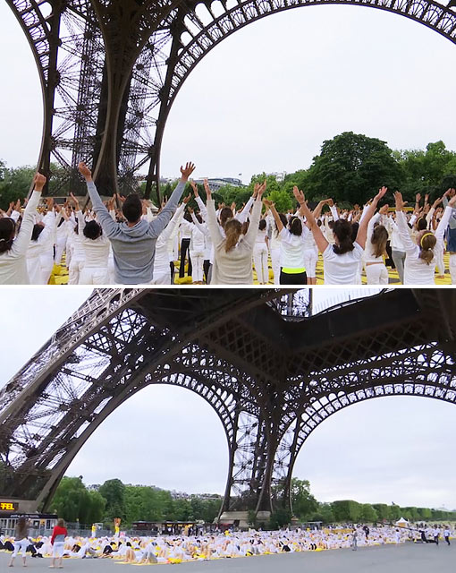 >1,500 people take part in yoga at the Eiffel Tower in Paris to celebrate first ever International Day of Yoga