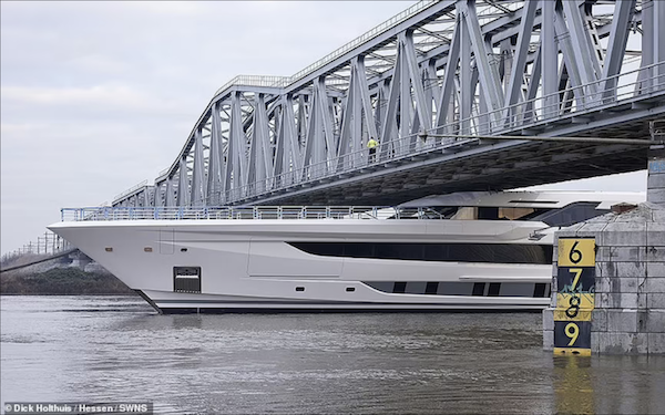How big is big enough? Super-sized luxury superyacht squeezes through Dutch canals and under bridges with only 5 inches to spare in a hair-raising feat of limbo