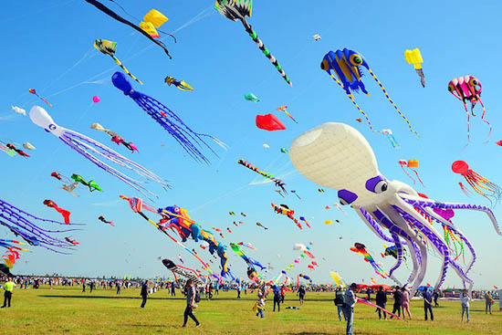 April 16 2021 soars on kite's wings. 38th Weifang International Kite Festival: world's biggest kite took 28 craftsmen 48 days to design and complete, 55 people to fly